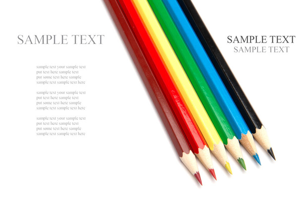 Lot of colorful wooden pencils on a white background - Foto, imagen