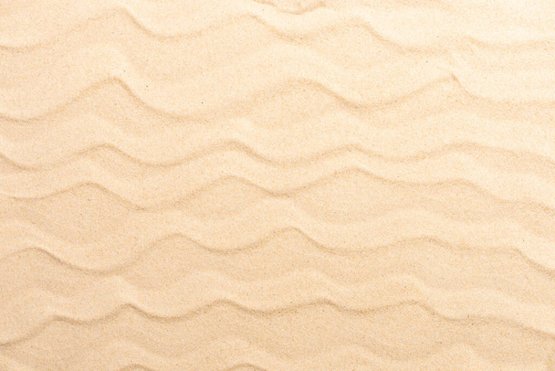Sandy beach for background. Sand texture close up. Flat lay and top view and above, copy space - Valokuva, kuva