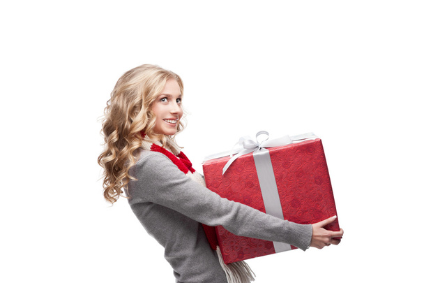 young smiling woman holding christmas gift - Fotografie, Obrázek