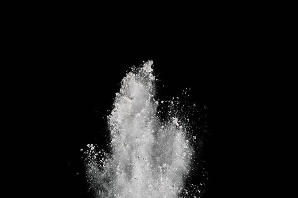 White powder explosion on black background. Colored cloud. Colorful dust explode. Paint Holi. - Foto, Imagem