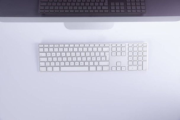 new modern computer keyboard with empty screen isolated on white background, close view  - Photo, Image