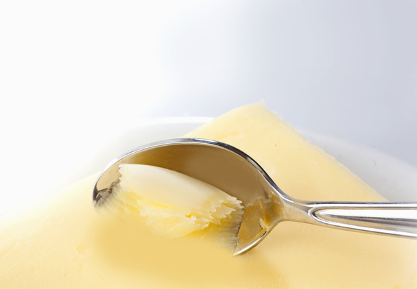 Cuchara y mantequilla
 - Foto, imagen