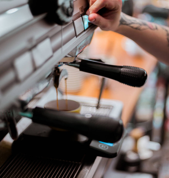 Professional coffee machine. Close up of a coffee holder.Soft focus - Фото, зображення