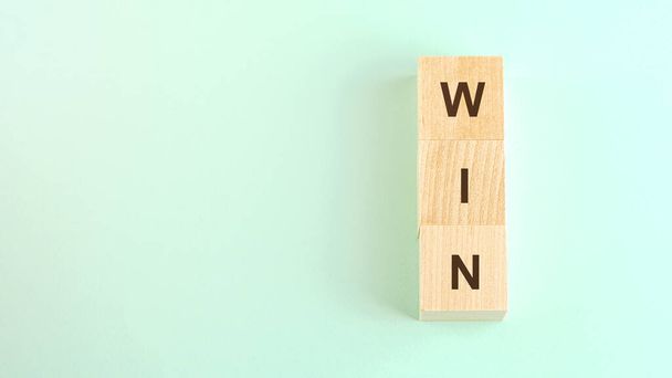 word win made with small wooden blocks and space for design - Photo, image