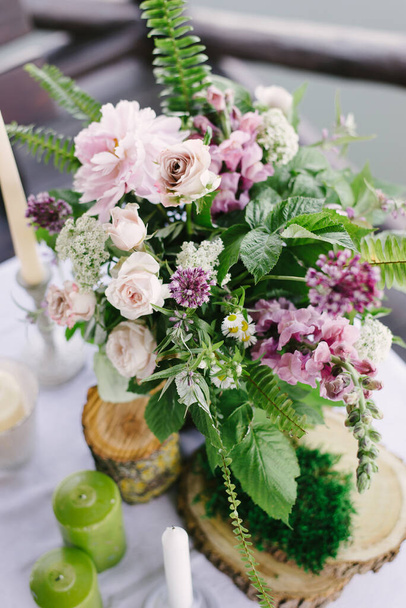 flowers,bridal decor closeup.Decoration made of peonies,roses and decorative plants - Фото, изображение