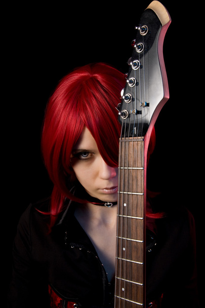 Redhead gothic girl with guitar - 写真・画像