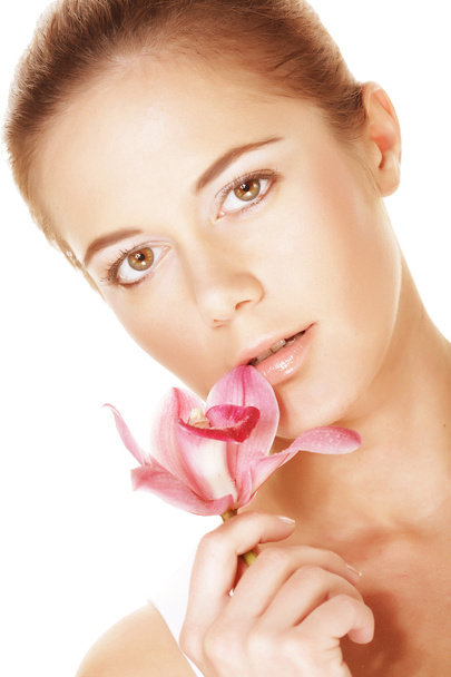 Beautiful woman with pink flower - 写真・画像
