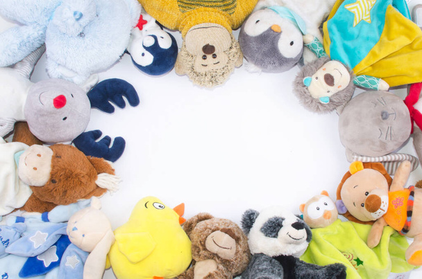 circle of various stuffed animals and space for text in the middle of the image - Photo, Image