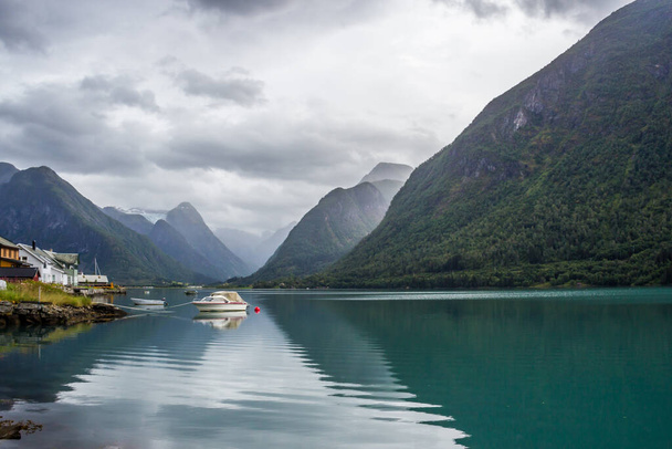 heavy clouds over the fjord in Norway - 写真・画像