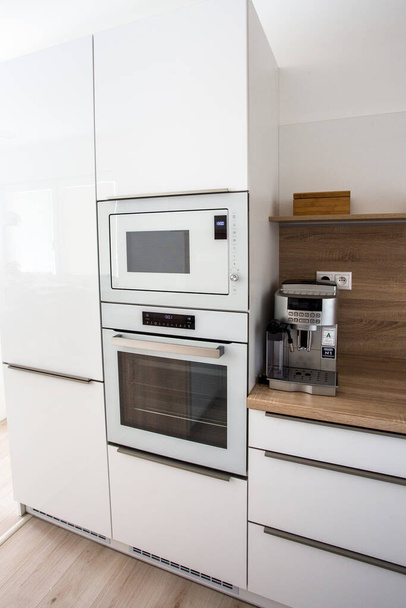 Modern kitchen with white color and wood - Photo, Image