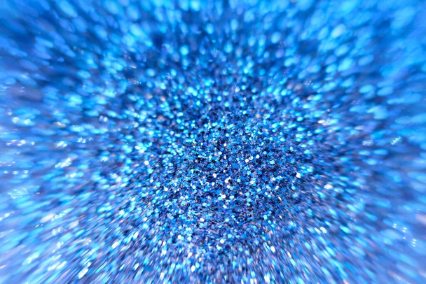 Fond bleu abstrait. Fond de lumières vintage scintillant avec des lumières déconcentrées - Photo, image