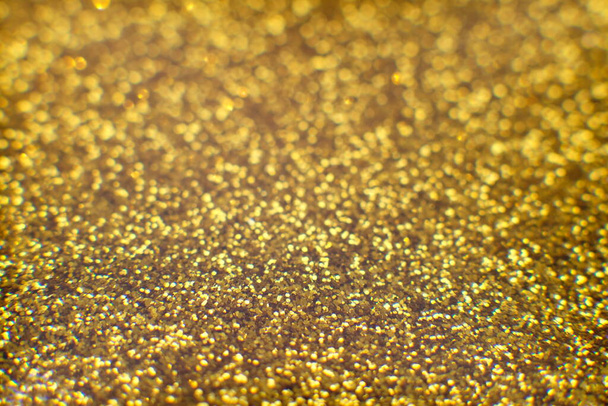 Fondo de oro abstracto. Brillo vintage luces fondo con luces desenfocadas. Navidad y Año Nuevo fiesta fondo bokeh
 - Foto, Imagen