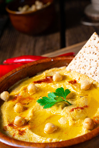 Delicious hummus paste with lemon and chilli - Photo, image