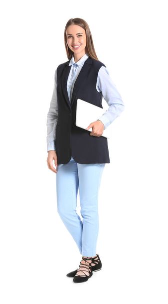 Beautiful young businesswoman with laptop on white background - Photo, image
