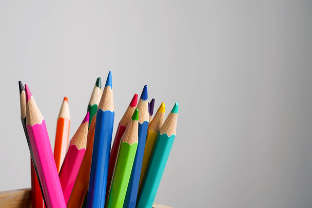 Colour pencils set on light gray background. Art, school, drawing concept. Close-up, copy space - Φωτογραφία, εικόνα
