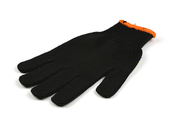Nouveaux gants de travail de couleur noire isolés sur fond blanc. Photo haute résolution. Profondeur de champ complète
. - Photo, image
