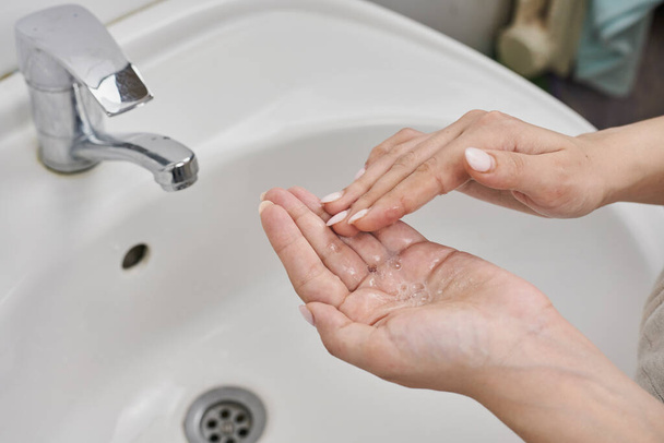Woman washing hands - Photo, Image