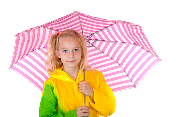 Young blonde girl under pink umbrella - Fotoğraf, Görsel