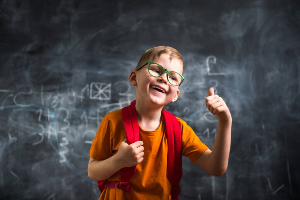 Child with glasses and thumbs up. Happy kid boy go back to school. - Photo, Image