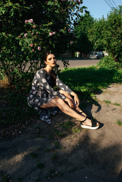 portrait of young woman posing in garden  - Fotografie, Obrázek