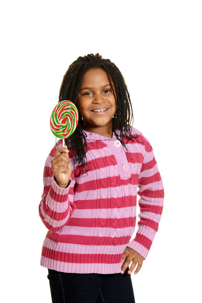 Happy little girl with lollipop - Photo, image