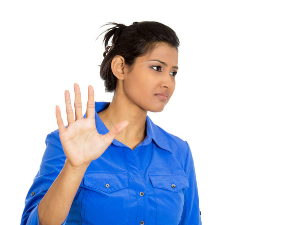 Portrait of a furious mad angry annoyed young woman raising hands gesturing to stop isolated on white background  - Φωτογραφία, εικόνα