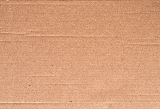 Textura de papel de cartón, superficie de material de cartón marrón - Foto, imagen