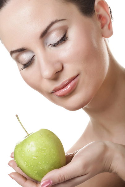 Young lady with green apple - Zdjęcie, obraz