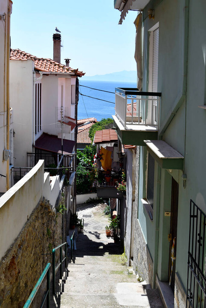 Greece, Kavala, path with steps in Panagia district in the city on Aegean sea - Photo, Image
