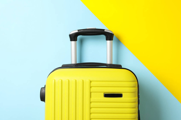 Color travel bag on two tone background - Zdjęcie, obraz