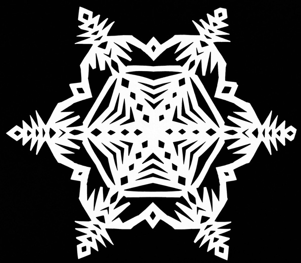 copo de nieve sobre papel negro
 - Foto, Imagen