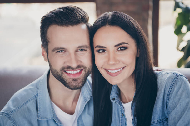 Close up photo of idyllic passionate loving family woman man enjoy spend quarantine together toothy smile wear denim jeans shirt in house room apartment indoors - 写真・画像
