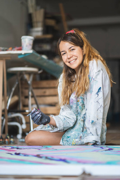 Beautiful girl painting art in Painting Studio - Photo, Image