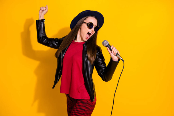 Portrait of her she nice-looking attractive lovely pretty fashionable cheerful straight-haired girl singing karaoke performing isolated over bright vivid shine vibrant yellow color background - Photo, Image