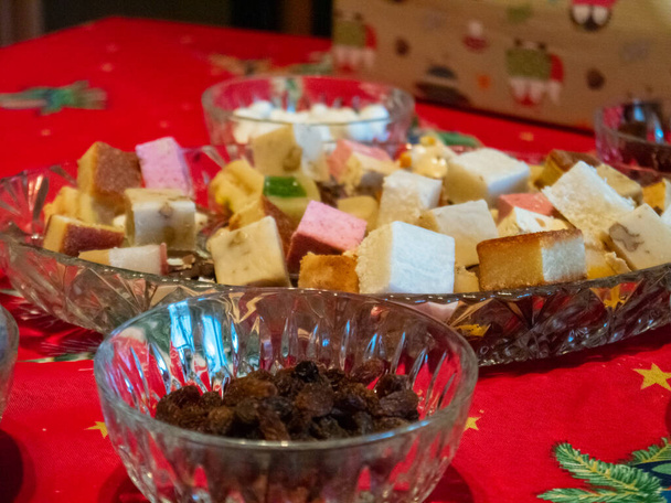 Christmas sweets usually present on Spanish homes. There are some mixed nuts, raisins, sugared almonds and mixed nougats. - Photo, Image