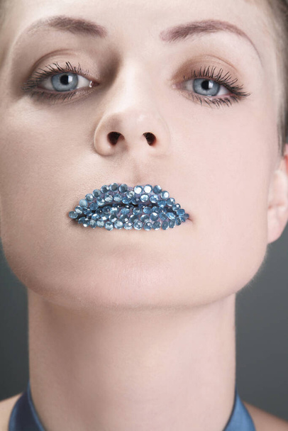 Woman with rhinestones on her lips - Foto, afbeelding
