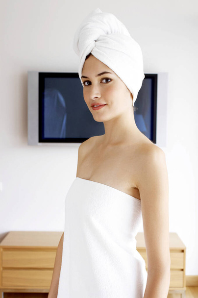 Woman in towel smiling - Photo, image