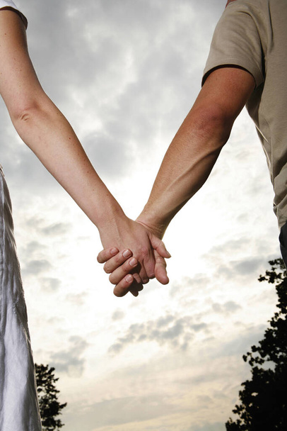 close up of Couple holding hands - Photo, Image
