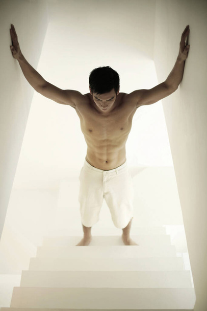 Man standing at the staircase - Photo, Image