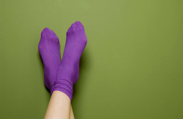 Woman in purple socks, close-up - Foto, Imagem