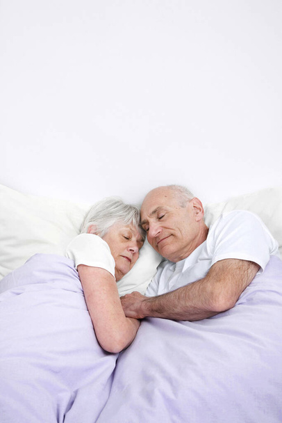 Senior man and woman sleeping together - Valokuva, kuva