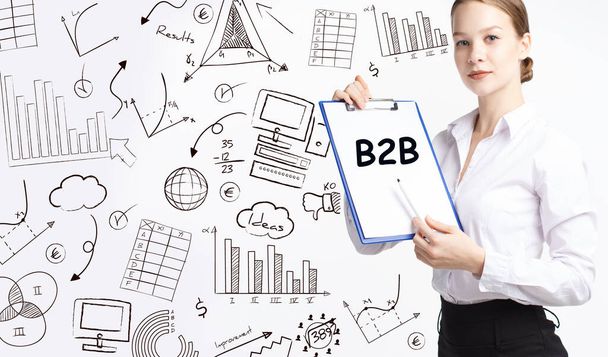Business, technology, internet and network concept. Young businessman thinks over the steps for successful growth: B2B - Φωτογραφία, εικόνα