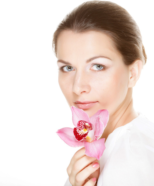 Beautiful woman with pink flower - Foto, Imagem