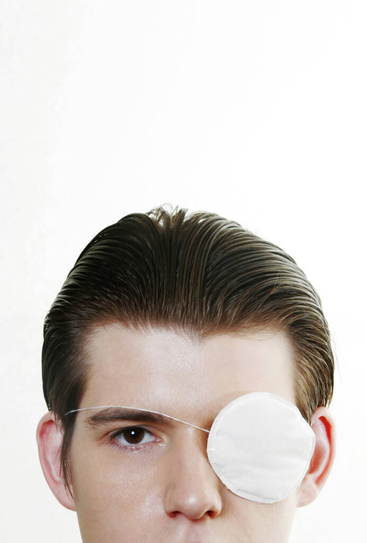Man with an eye-patch - Фото, изображение