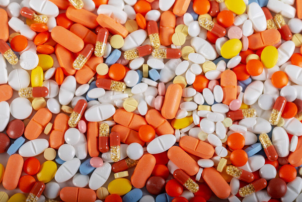 Colorful tablets and pills background - Photo, Image