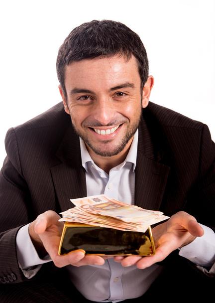homme d'affaires heureux avec un bar à or et des billets de banque
 - Photo, image