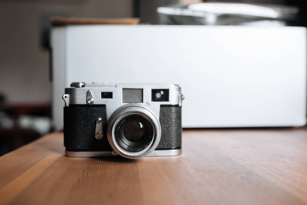 Vintage film camera on a white background - Valokuva, kuva