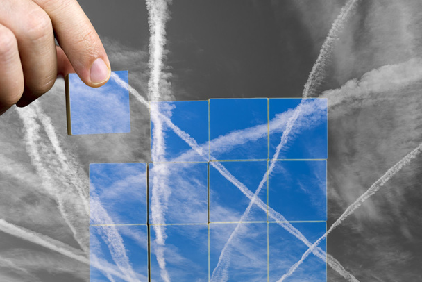 Puzzle with contrails in the sky - Photo, Image