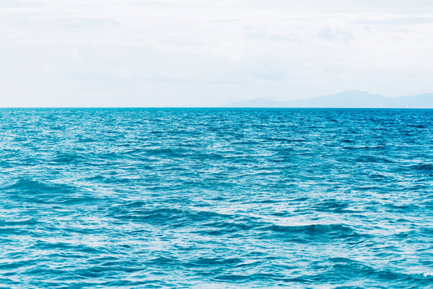 Bright Blue ocean with smooth wave background. - Photo, Image