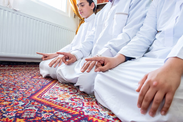 Muslim family almost finished praying - Fotoğraf, Görsel